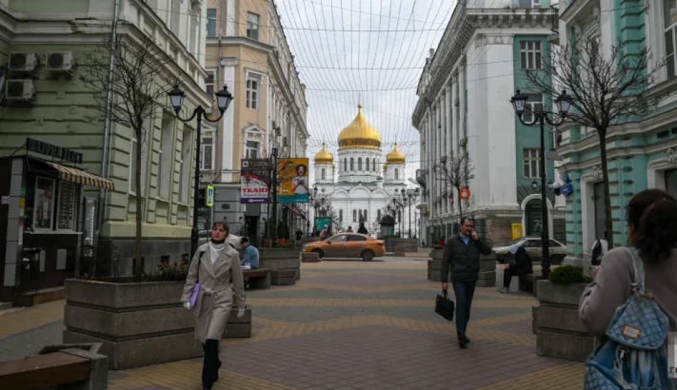 A generic square placeholder image with rounded corners in a figure.