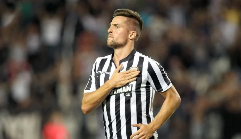 A generic square placeholder image with rounded corners in a figure.