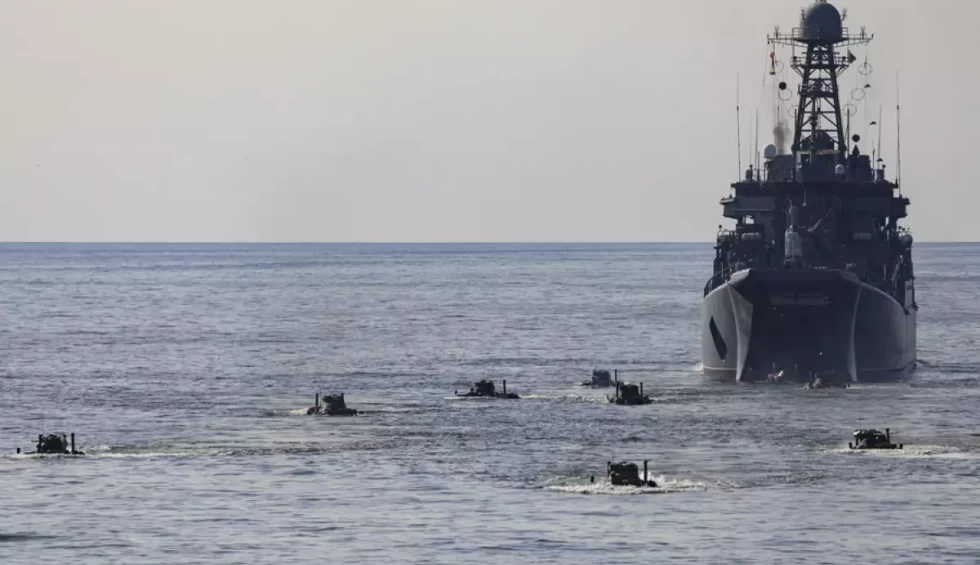 A generic square placeholder image with rounded corners in a figure.