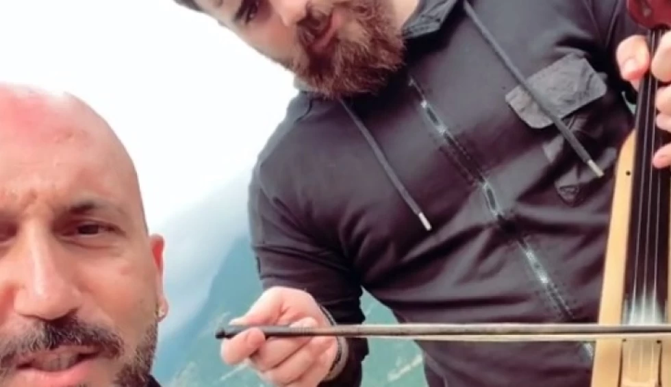 A generic square placeholder image with rounded corners in a figure.