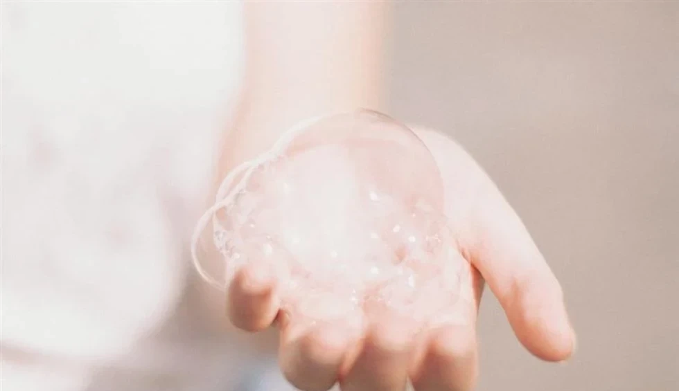 A generic square placeholder image with rounded corners in a figure.