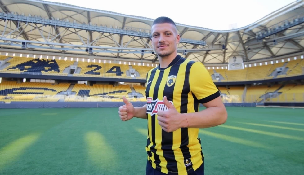 A generic square placeholder image with rounded corners in a figure.